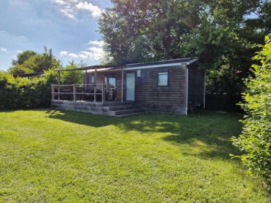 Mobilheim Limousin Confort 30m² Seeblick ( 3Sch-6pers) + überdachte Terrasse + TV