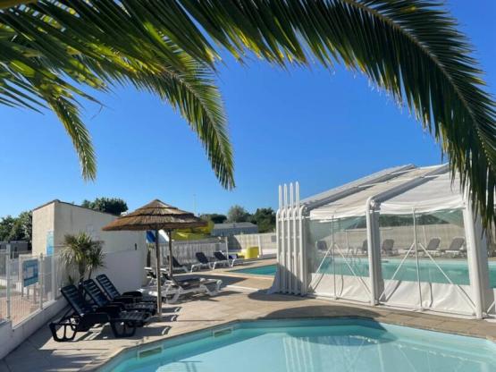 Pakket standplaats + 1 voertuig + tent of caravan