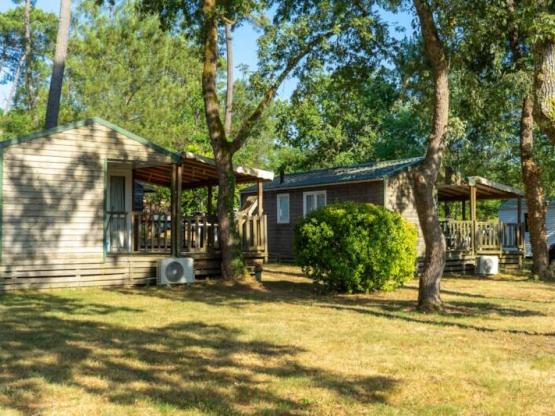 Mobil-home 2 habitaciones 26m² aire acondicionado y televisión con terraza cubierta